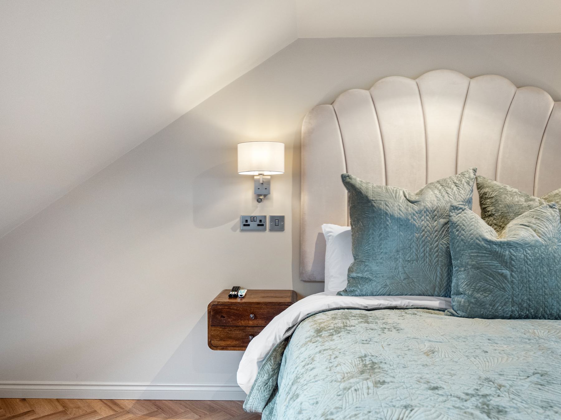Luxury bedroom photography, upholstered scallop headboard, Glasgow