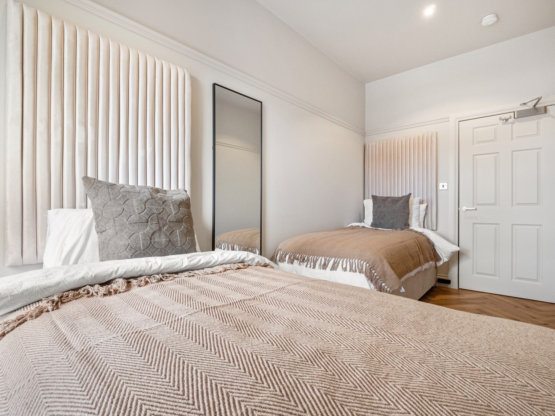 HDR property photography, twin bedroom with mirror detail