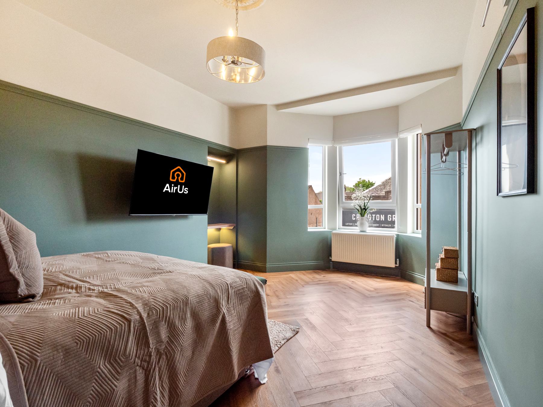Luxury 5-bedroom home in Glasgow, sage green bedroom suite