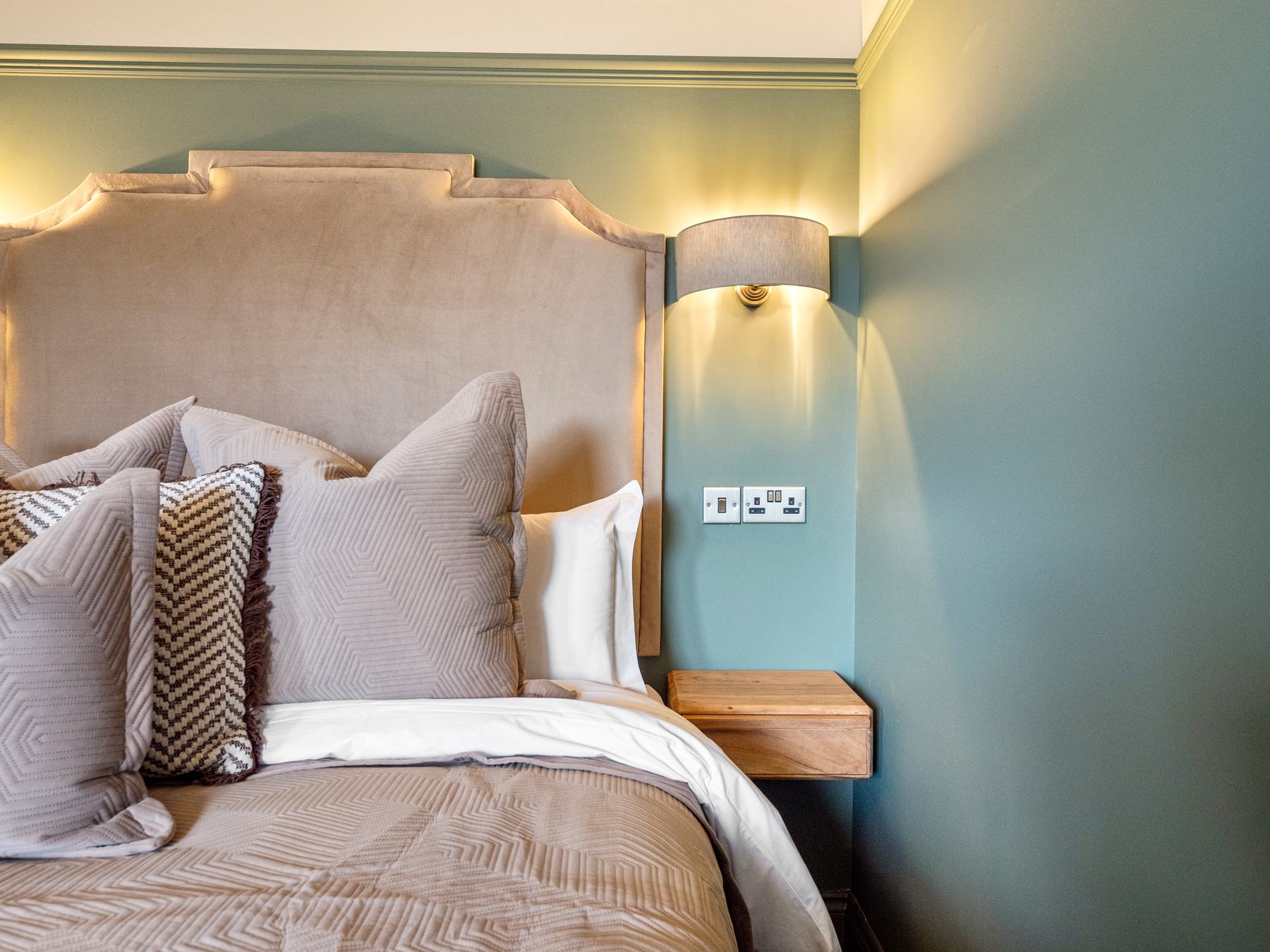 Property photography Glasgow, bedroom headboard and lighting detail