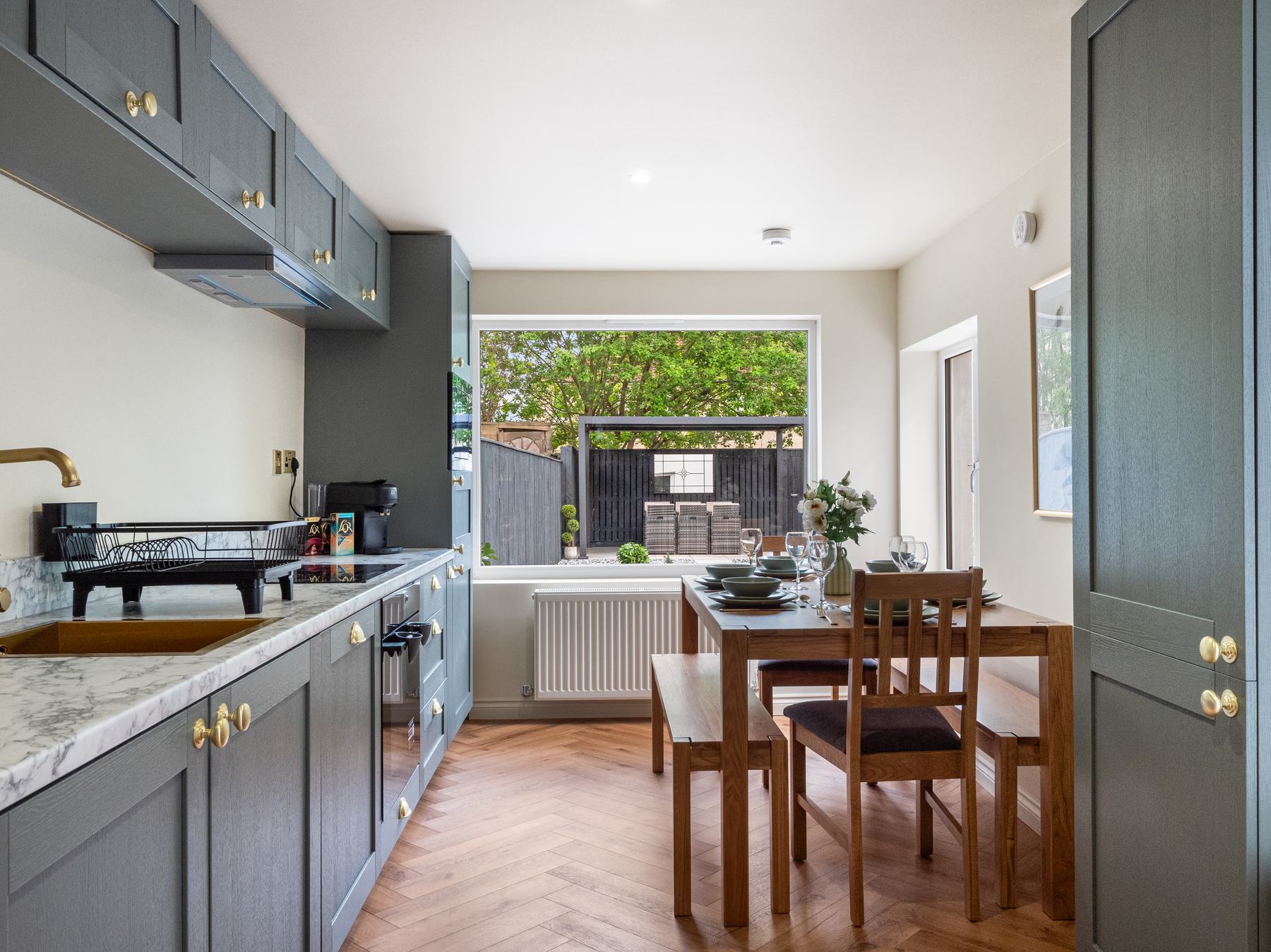 Modern kitchen photography, Glasgow, dining area and garden view
