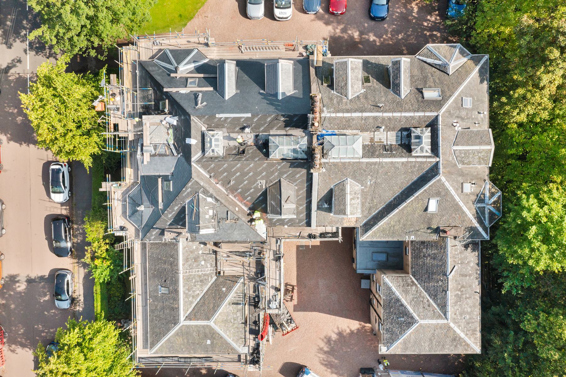 Close aerial photography of dormer windows and roofline