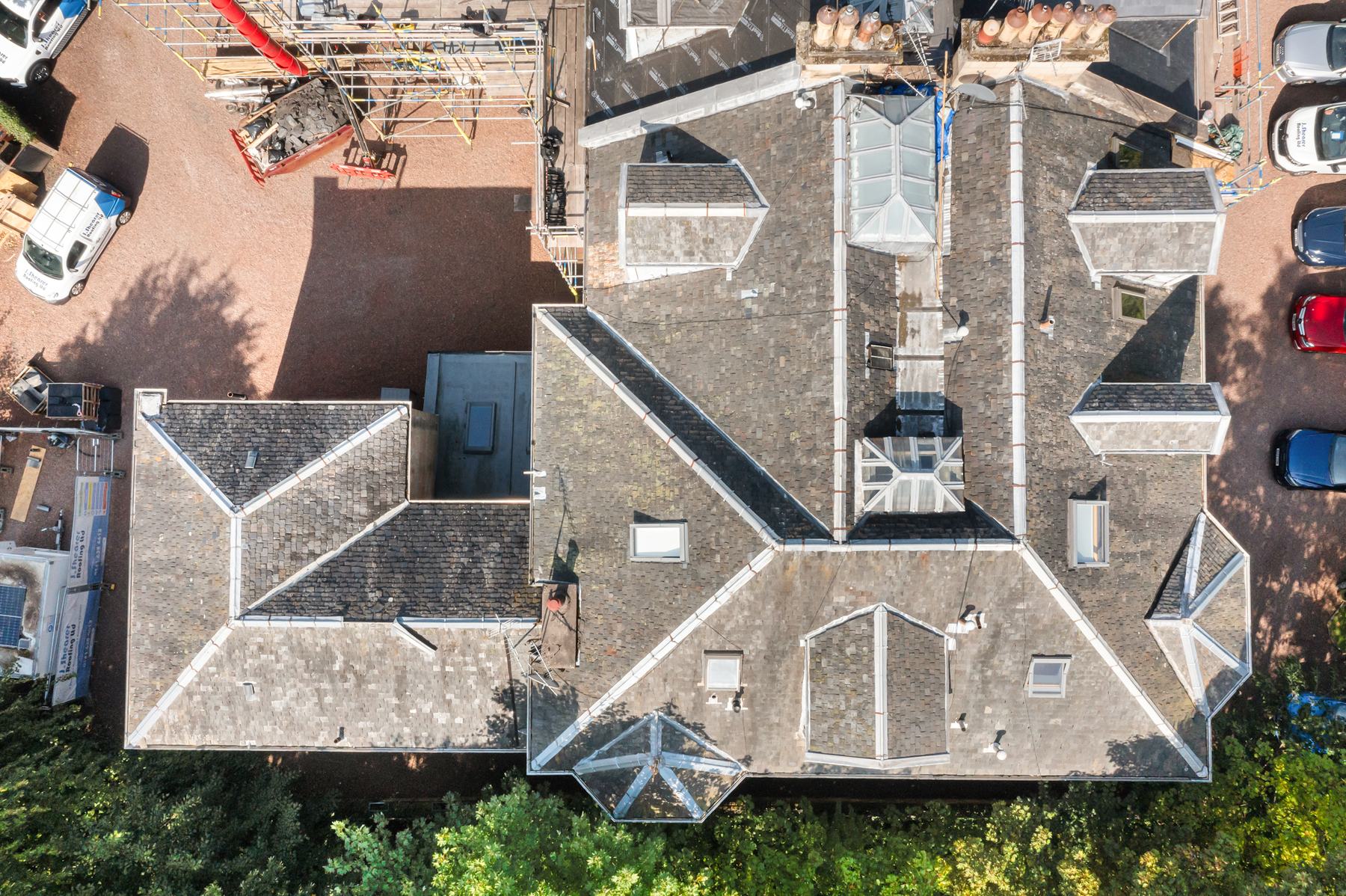 Aerial architectural photography of chimneys and skylights