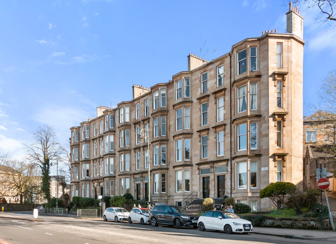 Sandstone tenement street corner in Glasgow