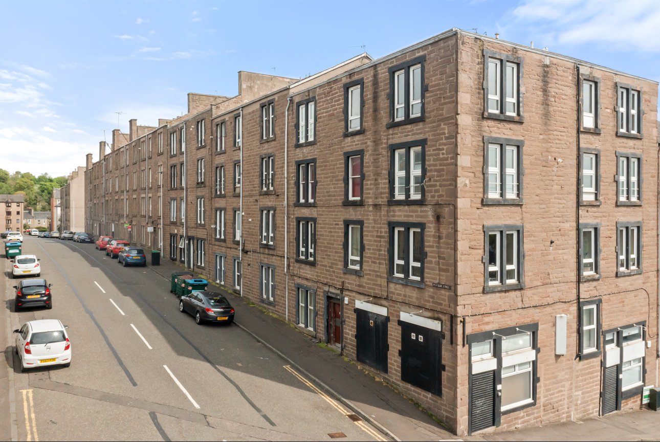 Red sandstone corner apartment block
