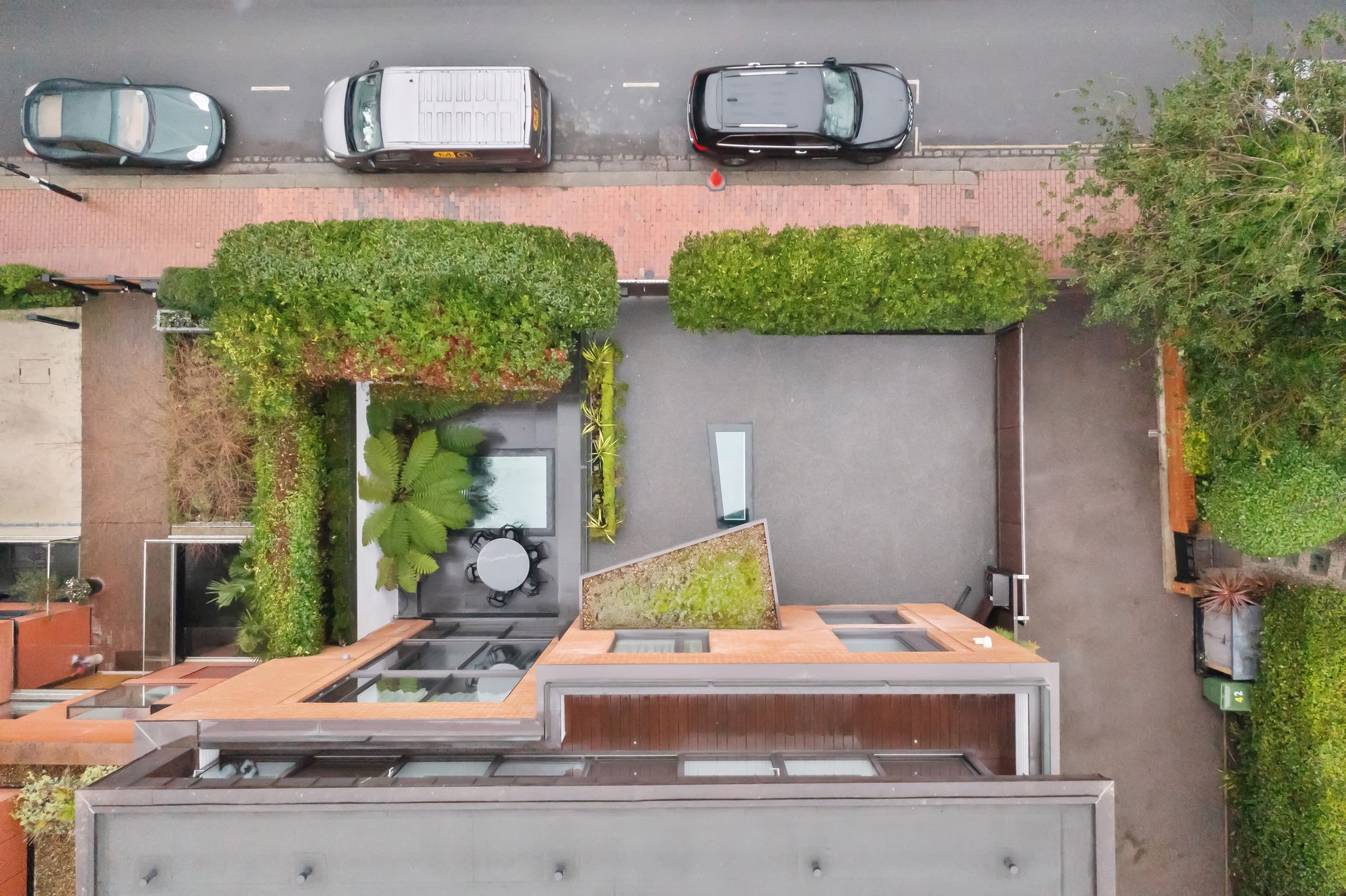 Aerial view of a rear courtyard and garden