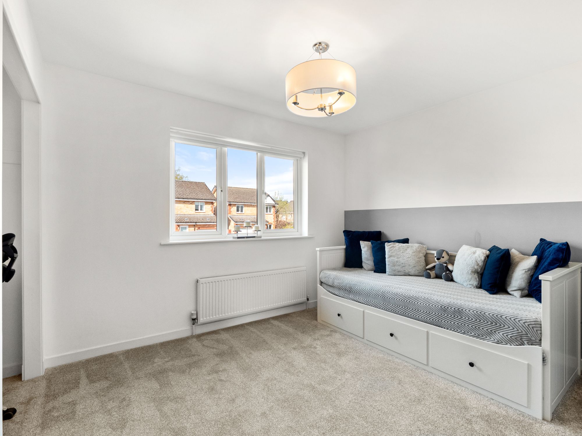 Children's bedroom with daybed and storage drawers
