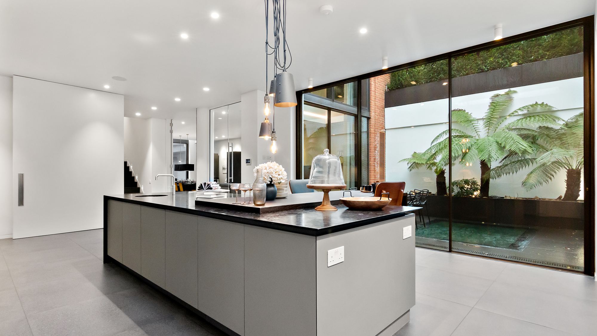 Kitchen island with view onto internal courtyard
